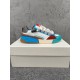 Dolce & Gabbana Panelled Trainer Lateral Profile in white and blue Lateral side view of Dolce & Gabbana mixed material low top trainer on shoebox in white and blue