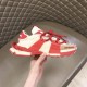 Dolce & Gabbana Space Red Trainer Profile in red and cream Hand holding Dolce & Gabbana red trainer showing outer side profile in red and cream