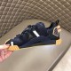 Dolce & Gabbana NS1 Trainer Medial Side View in black Medial side view of dark blue Dolce & Gabbana NS1 Low-Top Trainer held in hand in black