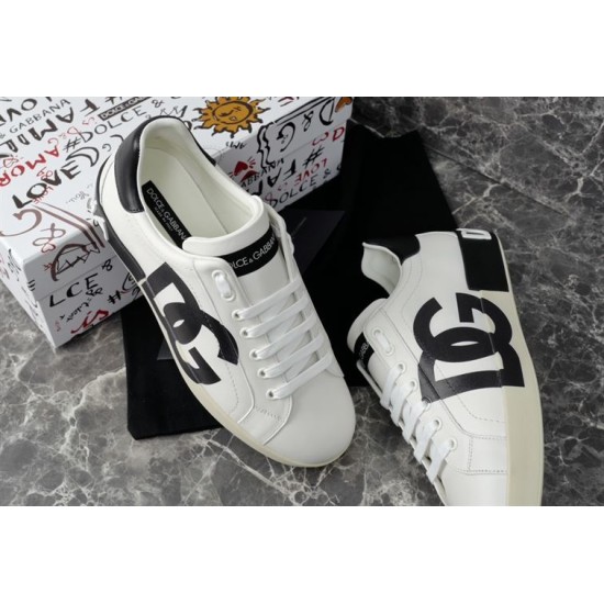 Dolce & Gabbana Portofino DG Logo Trainer Pair in white Three-quarter view of white Dolce & Gabbana Portofino trainers highlighting the side DG logo