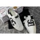Dolce & Gabbana Portofino DG Logo Trainer Pair in white Three-quarter view of white Dolce & Gabbana Portofino trainers highlighting the side DG logo
