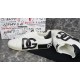 Dolce & Gabbana Portofino White Trainer Profile Side profile of white Dolce & Gabbana Portofino trainer resting beside second shoe