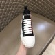 Front toe perspective of Dolce & Gabbana Tartan Canvas Mid-Top High-Top Trainers in green