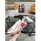 Hand holding Dolce & Gabbana Portofino Love Leather Trainers White Red showing red DG print and Milano text