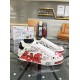 Dolce & Gabbana Portofino Love Leather Trainers White Red lateral side view on glass table