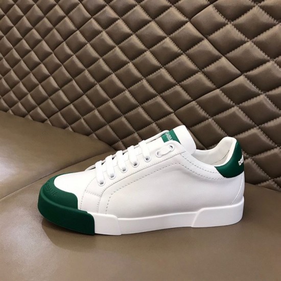 Dolce & Gabbana Portofino Trainer Front Angle in white and green Front oblique view showing white leather upper and green rubber toe cap