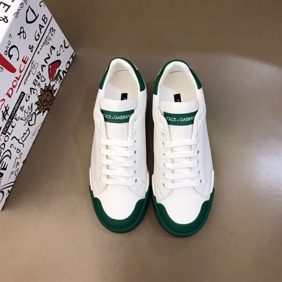 Dolce & Gabbana Portofino Trainers Overhead View in white and green Top-down view of white leather Portofino trainers with green toe caps and branded tongues