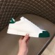 Dolce & Gabbana Portofino Trainer Outer Profile in white and green Outer side profile of single white and green leather Portofino low-top trainer