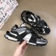 Dolce & Gabbana Space Low-Top Trainers In Black And Grey Side View Handheld Dolce & Gabbana Space Low-Top Trainers In Black And Grey held side view