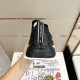 Heel view of Dolce & Gabbana Black Stretch Mesh Slip On Trainer showing pull tab