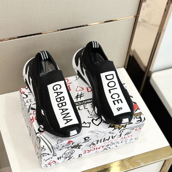 Pair of Dolce & Gabbana Black Stretch Mesh Slip On Trainers top view on box
