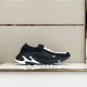 Dolce & Gabbana Black Stretch Mesh Slip On Trainers lateral side view on shelf