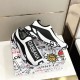 Dolce & Gabbana Fast Slip-On Trainers Pair in white and black Pair of Dolce & Gabbana white and black fast slip-on trainers arranged on printed shoe box