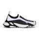 Dolce & Gabbana White And Black Trainer Lateral View Full lateral side view of single Dolce & Gabbana white and black stretch mesh trainer