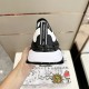 Dolce & Gabbana Trainer Heel View in white and black Rear view of Dolce & Gabbana white and black trainer showing heel counter and pull tab