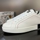 Close-up of the white leather toe box and lace closure on Dolce & Gabbana trainers in white and black