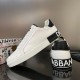 Rear heel view showing the black logo block on white Dolce & Gabbana trainers