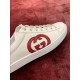 Gucci Ace Interlocking G Logo Detail in off-white and red Close-up view of the red Interlocking G logo on off-white leather Gucci Ace trainers