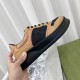 Gucci Monogram Leather Chunky Sole Trainers Black Brown Handheld Handholding side view of Gucci Monogram Leather Chunky Sole Trainers in black and brown displaying the thick sole
