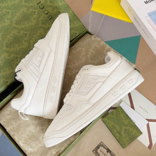 Gucci White Leather Trainers Side View in white and gold Side and angled profile view of white Gucci leather trainers resting in branded box in white and gold