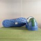 Gucci Ace Blue Trainer Heel and Sole View in blue and green Rear view of Gucci Ace blue trainer heel with green embossed leather tab next to blue patterned tread sole