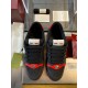 Gucci black and red web low top trainers top-down view