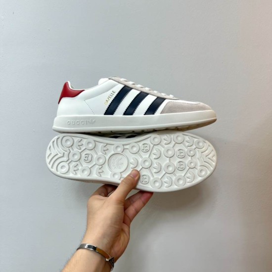Gucci Gazelle Trainer Outsole and Tread Detail in white and black Gucci Gazelle trainer shown alongside tread pattern on the white rubber outsole in white and black