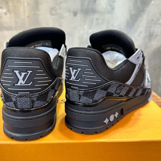 Rear view showing black heel panels and branded details of L Trainer Damier Denim Black Low Top Sneakers in black and grey