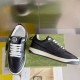 Gucci Black Leather Low Top Trainers pair showing front and medial side in black and white