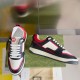 Gucci Low Top Trainers Side and Top View in multicolour and black Side profile and top view of black, red and white leather trainers in multicolour and black