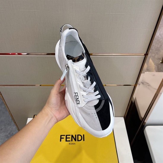 Handheld Top Angle View of Fendi Flow Trainer in white and grey Hand holding a single black and white Fendi Flow trainer from above in white and grey