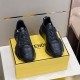 Pair of Fendi Flow Black Leather Low Top Trainers front top-down view on yellow box