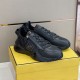 Angled front view of Fendi Flow Black Leather Low Top Trainers on shoe box