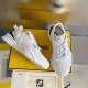 Fendi Flow White Leather Low Top Trainers - Display View Pair of Fendi Flow white leather trainers arranged on a yellow presentation box.