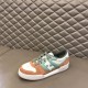 Fendi Match Suede Low Top Trainer Side Elevation in orange and green Side elevation of Fendi Match Suede Low Top Trainer showing orange suede details in orange and green