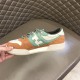 Fendi Match Suede Low Top Trainer Inner Side View in orange and green Inner side profile of Fendi Match Suede Low Top Trainer showing rubber sole rim in orange and green
