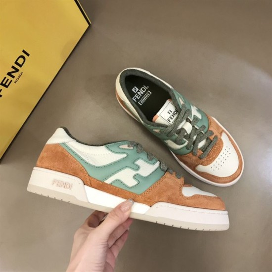 Fendi Match Suede Low Top Trainers Top View in orange and green Top-down view of Fendi Match Suede Low Top Trainers on a surface in orange and green