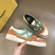 Fendi Match Suede Low Top Trainers Top View in orange and green Top-down view of Fendi Match Suede Low Top Trainers on a surface in orange and green