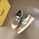 Fendi Match Suede Low Top Trainers Overhead Angle in orange and green Angled top view showing the laces and insoles of Fendi Match Trainers in orange and green