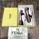 Fendi Match low-top trainers placed inside open yellow presentation shoe box with dust bag in black and off-white