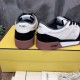 Rear view of Fendi Match trainers showing off-white heel counter and black suede overlays