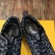 Fendi Tongue and Insole Detail in grey Close-up of leather tongue patches and inner soles on Fendi trainers in grey
