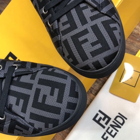 Fendi Monogram Toe Cap View in grey Top-down view of grey monogram toe caps on Fendi low top trainers
