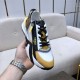 Top-down view of the Fendi Flow trainer highlighting the black laces and upper design in multicolour and white