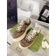 Gucci Brown Monogram Trainers Pair View in brown and green Pair of Gucci brown monogram canvas and leather trainers angled on box in brown and green