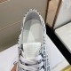 Close-up of the inner collar and smooth leather tongue on Givenchy 4G jacquard trainer in black and white