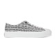 Side profile of Givenchy City low top trainers in black and white 4G jacquard