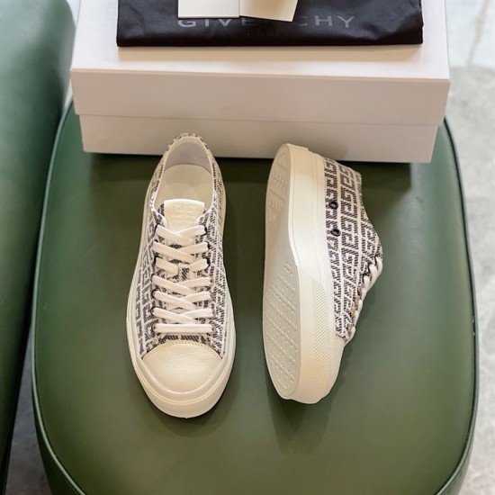 Top view of two Givenchy City 4G jacquard trainers showing upper laces and rubber tread in black and white