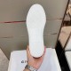 Bottom view of white rubber sole on Givenchy City trainer featuring geometric tread in black and white