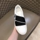 Givenchy White Leather Trainer Front View in white and black Front view of Givenchy white trainer showing toe cap and black elasticated cross strap